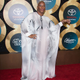 Illustration for article titled Sparkles, Satin and One Fabulous Bird Caftan at the Soul Train Awards